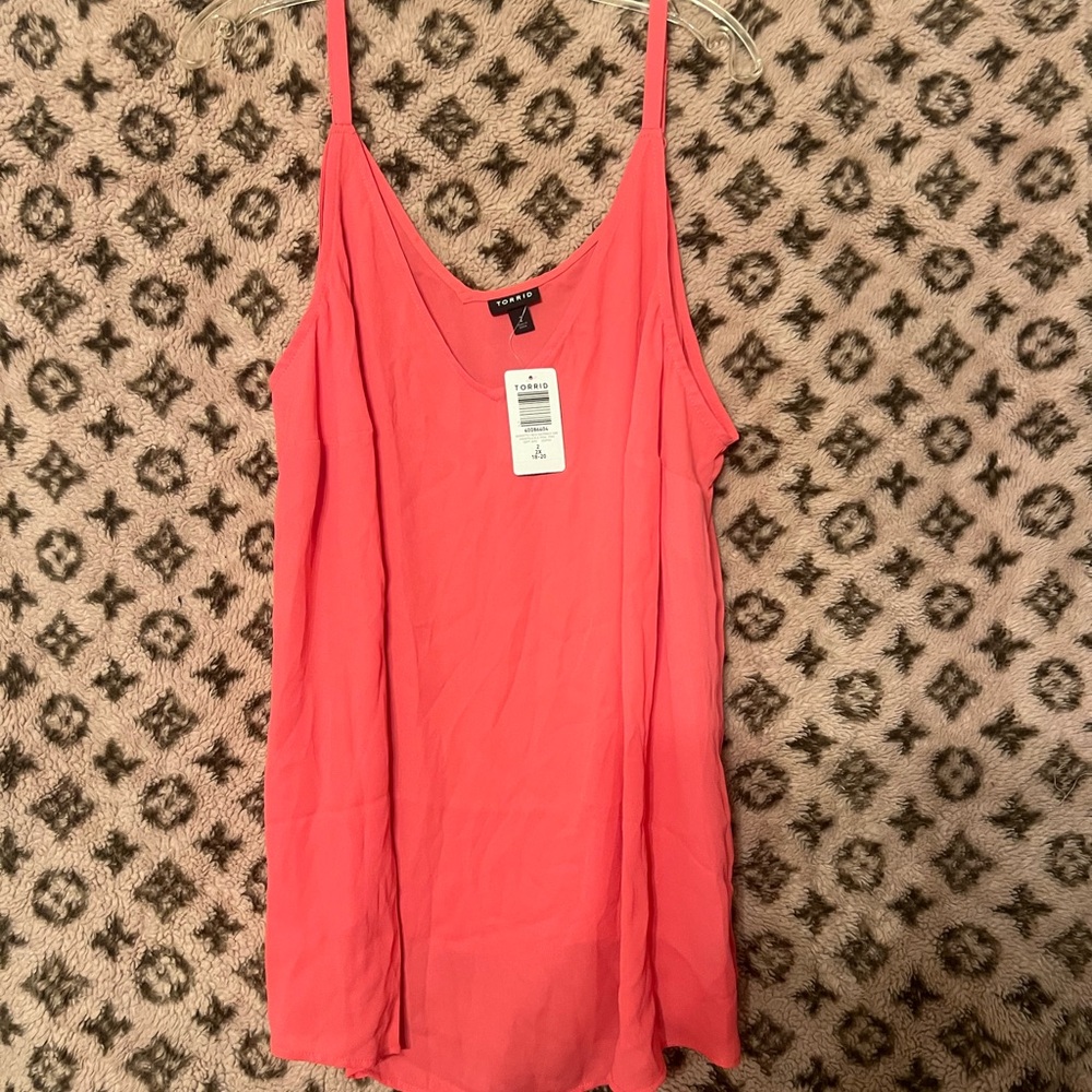 Torrid Pink , Rust, coral tank tops each $15